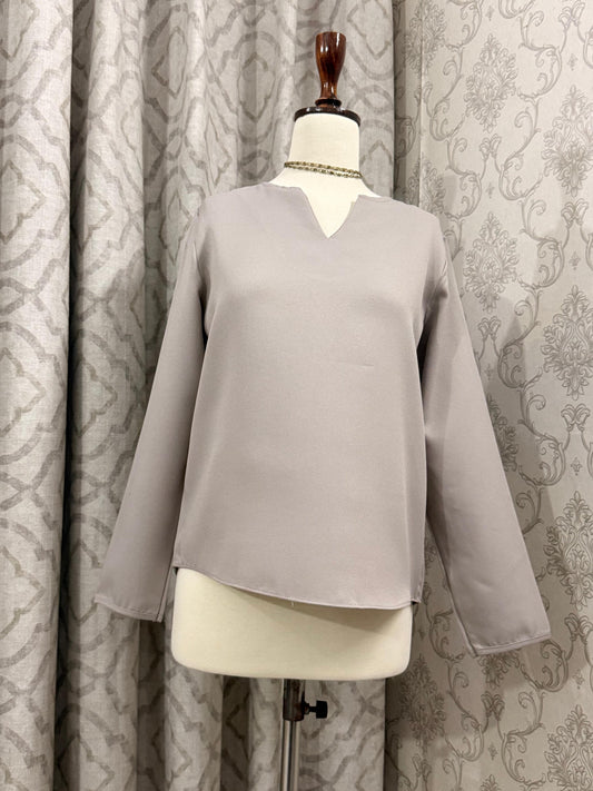 Minimalist Taupe Split-Neck Blouse with Curved Hem & Long Sleeves