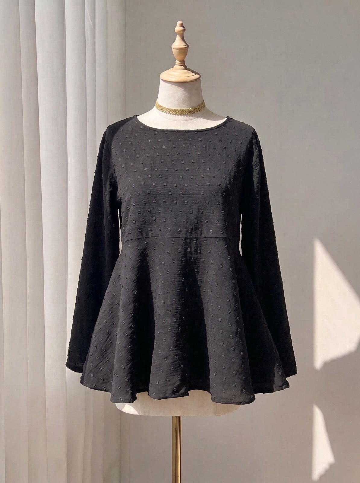 Black Textured Top with Empire Waist and Flowy Hem