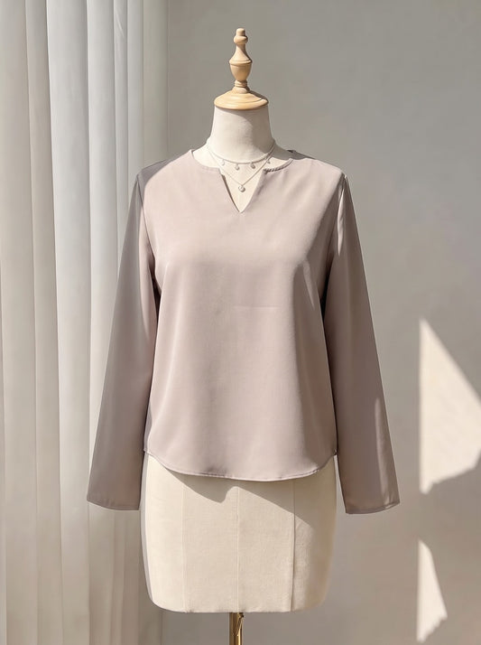 Minimalist Taupe Split-Neck Blouse with Curved Hem & Long Sleeves