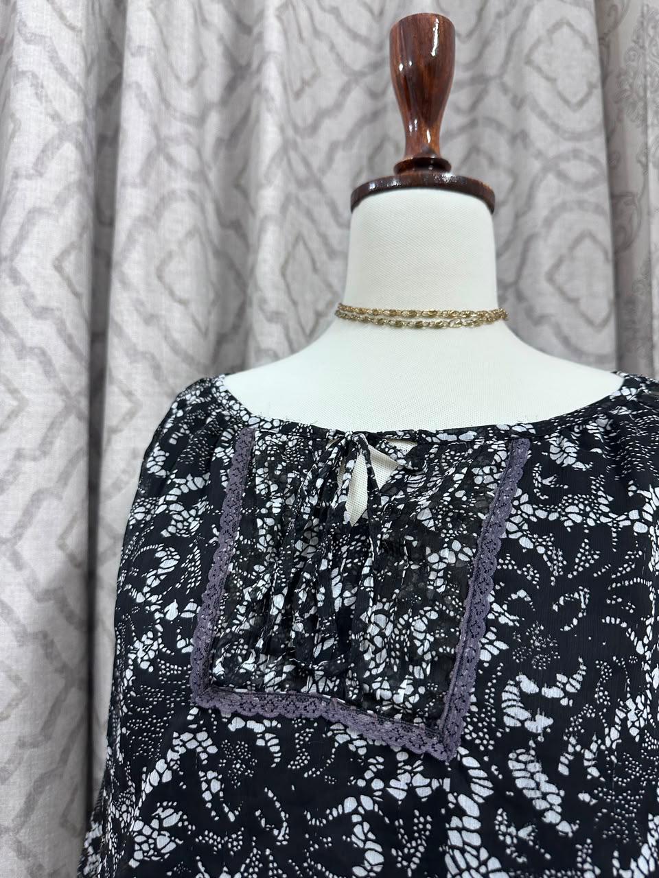 Boho Chic Printed Peasant Top with Tassel Tie Neck & Ruffled Cuffs