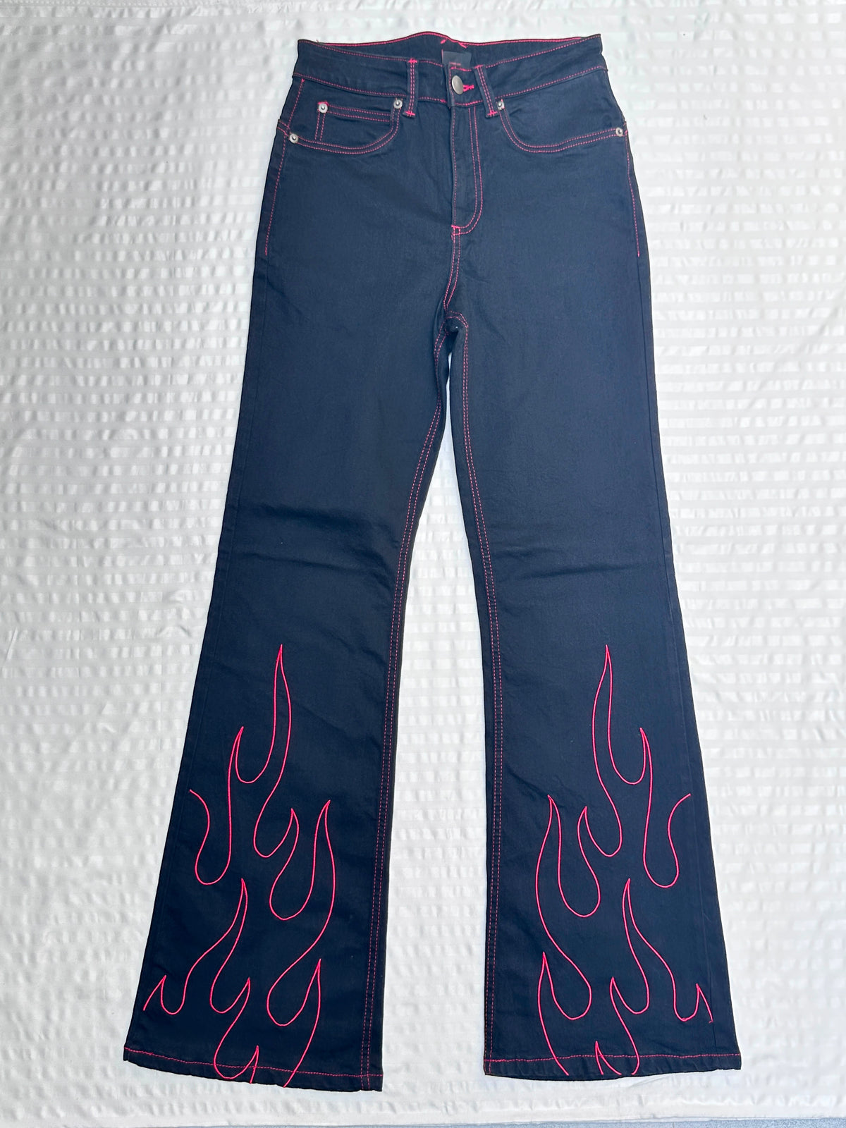 High-Waisted Black Flare Jeans with Red Flame Embroidered Hem & Contrast Stitching
