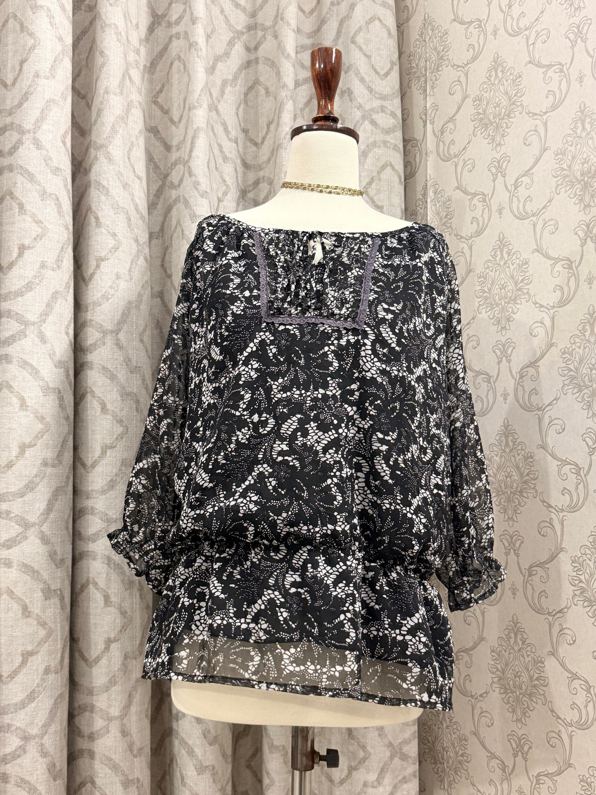 Boho Chic Printed Peasant Top with Tassel Tie Neck & Ruffled Cuffs