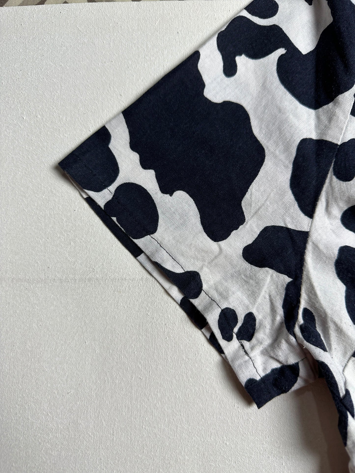 Monochrome Cow Print Front-Knot Top & Black Layered Dress Combo