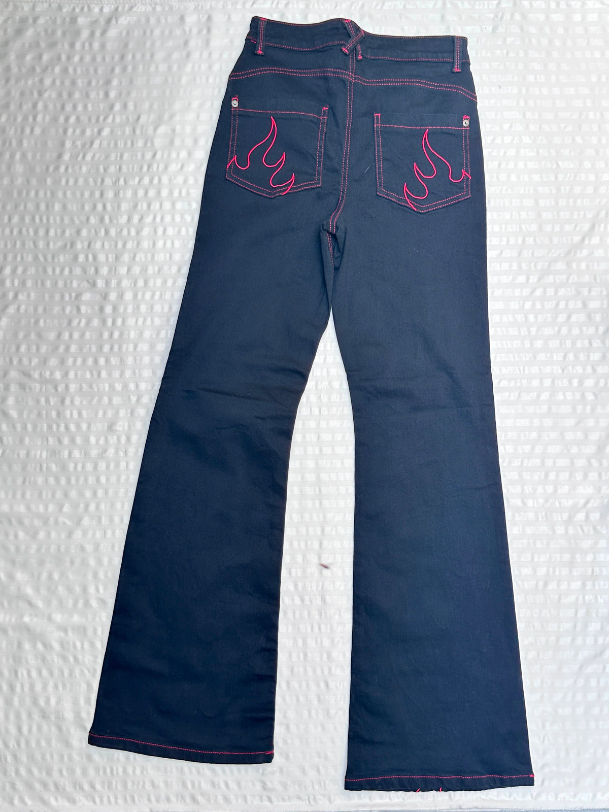 High-Waisted Black Flare Jeans with Red Flame Embroidered Hem & Contrast Stitching