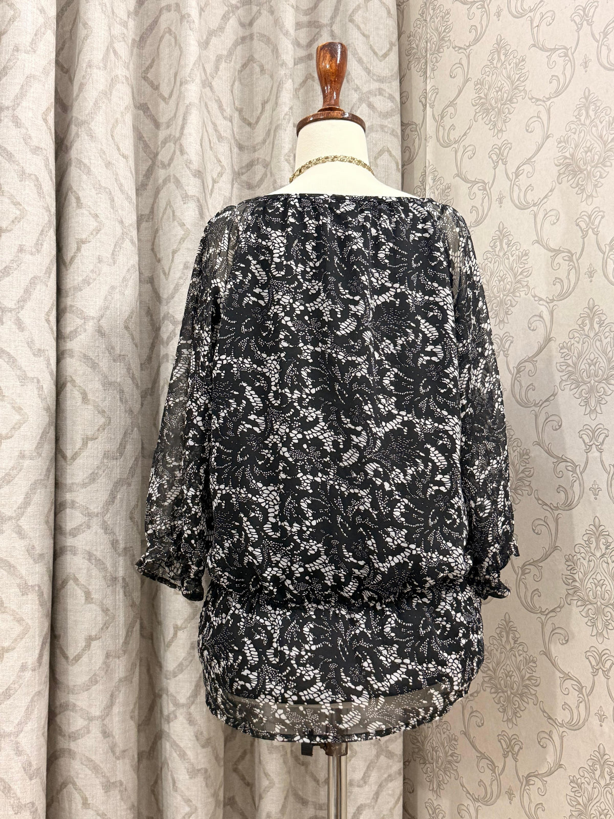 Boho Chic Printed Peasant Top with Tassel Tie Neck & Ruffled Cuffs